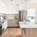 Well-lit open kitchen with island & ample counter space at 18 Dock apartment rentals in Stamford.
