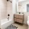 Stylish bathroom with shower at 18 Dock luxury apartments in Stamford.